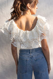 With a fitted silhouette, this versatile bodysuit features crochet and ruffle detailing, crafted for a unique style. white color.