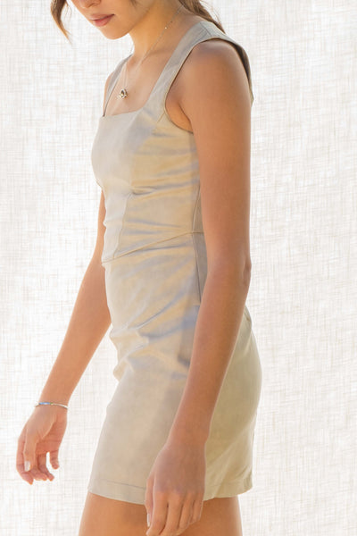 ane Faux Leather Mini Dress - perfect for a night out! Made of high-quality faux leather, this dress features a square neckline and a back zipper closure for a sleek look. Its mini length and sleeveless design