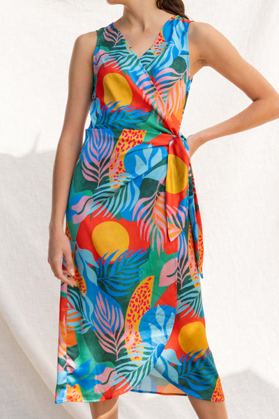This midi dress is the perfect vacation companion, made from lightweight fabrics to beat the summer heat. Its colorful print and plunge neckline bring a playful touch, while the wrap tie detail adds figure-flattering style.