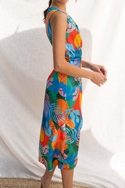 This midi dress is the perfect vacation companion, made from lightweight fabrics to beat the summer heat. Its colorful print and plunge neckline bring a playful touch, while the wrap tie detail adds figure-flattering style.