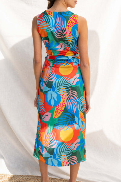 This midi dress is the perfect vacation companion, made from lightweight fabrics to beat the summer heat. Its colorful print and plunge neckline bring a playful touch, while the wrap tie detail adds figure-flattering style.
