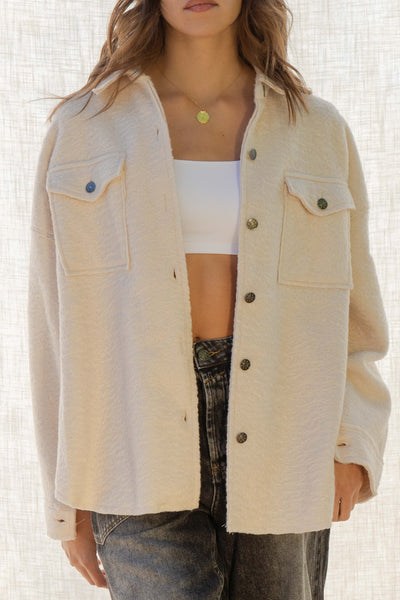 he Mandy Oversized Shirt Jacket - the perfect combination of fashion and functionality. This chic piece features a collared neckline, front button down closure, and front pockets for added convenience. With a relaxed fit and long sleeves, this jacket is both comfortable and stylish