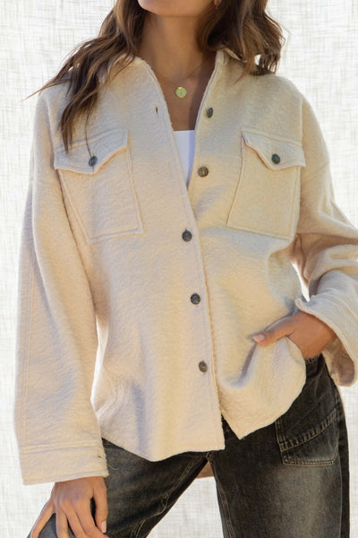 he Mandy Oversized Shirt Jacket - the perfect combination of fashion and functionality. This chic piece features a collared neckline, front button down closure, and front pockets for added convenience. With a relaxed fit and long sleeves, this jacket is both comfortable and stylish