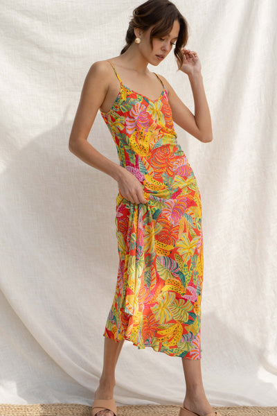 Featuring a tropical print, a V neckline, a relaxed fit and a midi length.