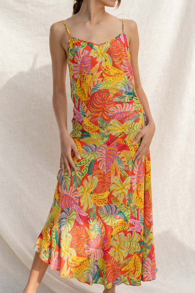 Featuring a tropical print, a V neckline, a relaxed fit and a midi length.