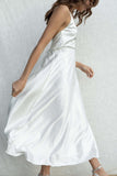 With thin straps and a fitted bust, this dress offers a relaxed fit for all-day comfort. white color.