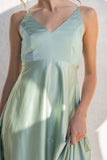 With thin straps and a fitted bust, this dress offers a relaxed fit for all-day comfort. sage color.