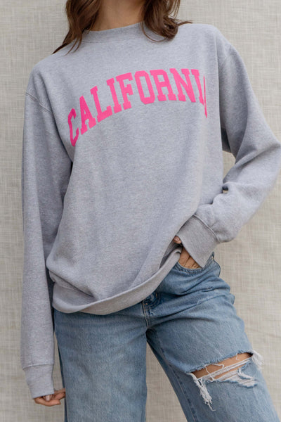 With an oversized fit, long relaxed sleeves, and a fun California print, this cozy crewneck is perfect for everyday wear. grey color.