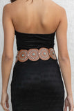 Featuring a unique circular shape and vibrant turquoise stone detail, this belt will add a touch of fun to any outfit.