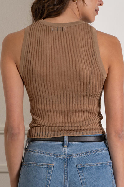 This versatile tank top features see-through mesh details that add a touch of glamour to any outfit. The relaxed fit and lightweight material. camel color.
