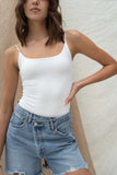 Bodysuit featuring simple and thin straps, a low back and double-layered construction for extra support, with comfort.