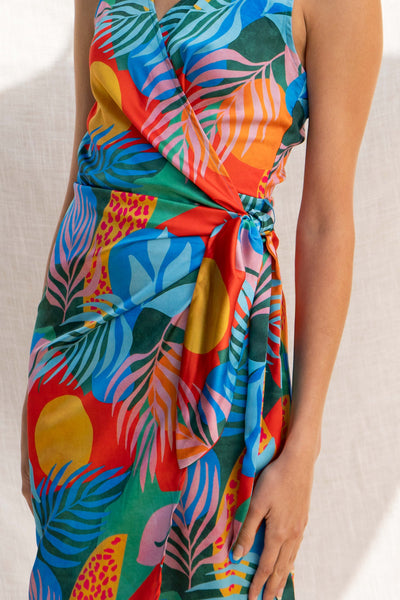 This midi dress is the perfect vacation companion, made from lightweight fabrics to beat the summer heat. Its colorful print and plunge neckline bring a playful touch, while the wrap tie detail adds figure-flattering style.