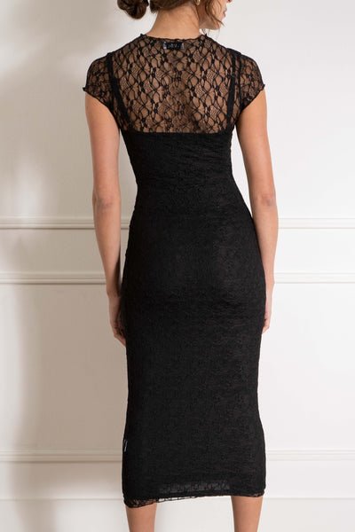 This stunning dress features delicate lace detailing and a flattering tight fit. black color.