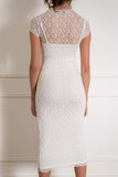 This stunning dress features delicate lace detailing and a flattering tight fit. white color.