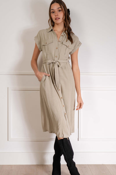 Made with linen details, it's both comfortable and stylish. The buttons down the middle add a touch of sophistication, while the short sleeves keep you cool.  sage color.