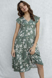 Featuring a plunging neckline, button details, and a fitted bodice, this versatile dress is perfect for any occasion. With its playful floral print and short sleeves.