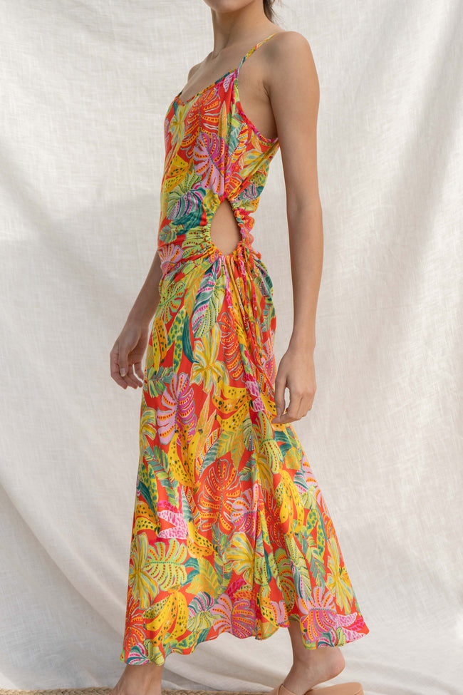 Featuring a tropical print, a V neckline, a relaxed fit and a midi length.
