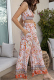 This two piece set features a stylish cropped top and flowy palazzo bottoms, both adorned with a colorful boho floral print. Adjustable straps and a coordinating belt make for a comfortable and customized fit.