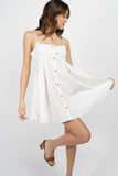 This Babydoll Mini Dress features adjustable straps and buttons for maximum comfort, available in two colors
