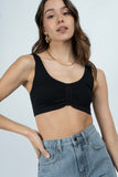 The Kylie Shirred Bralette is designed with soft, ribbed fabric for optimal comfort and style.