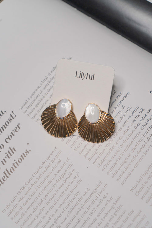 seashell shaped stone imbedded earrings.