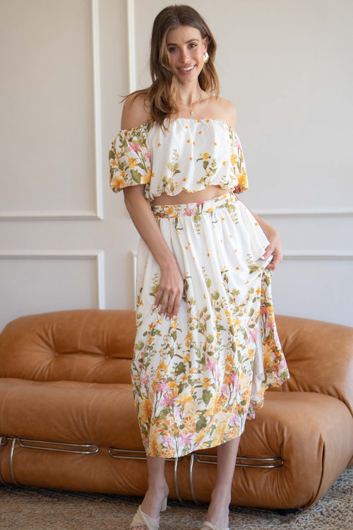 designed with florals for a stylish look. It boasts an elastic waistband for extra comfort and a perfect fit and is conveniently paired with a matching top.
